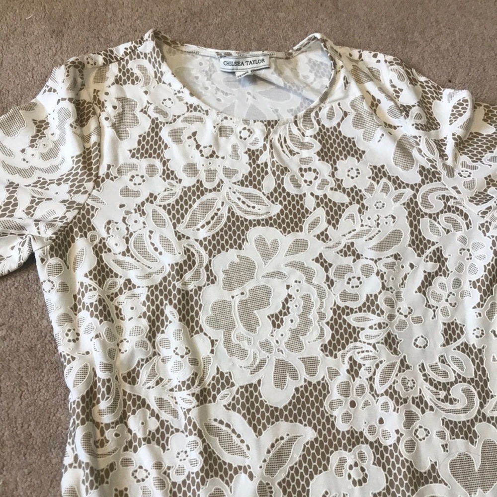 Its a dress with printed work on it